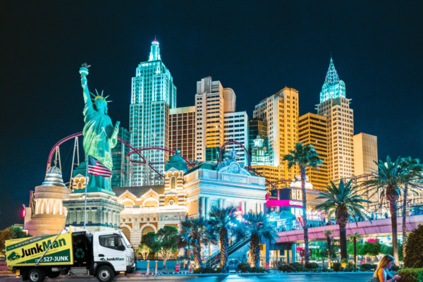 Las Vegas skyline with JunkMan truck during night.